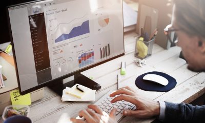 analytics dashboard worker viewing at desk