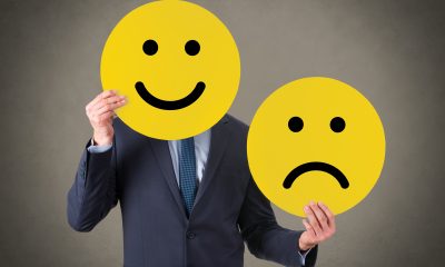 businessman happy sad