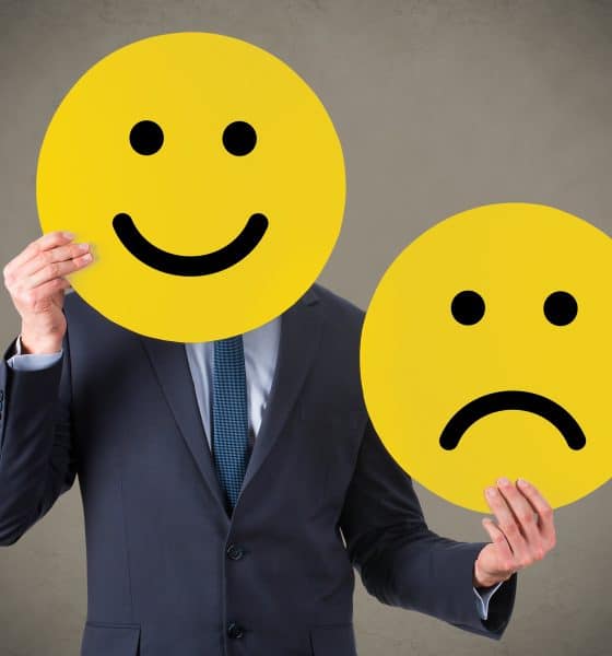 businessman happy sad