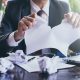 businessman tearing up contract
