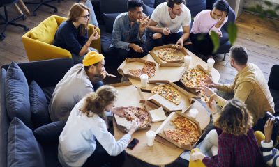 eating pizza in the office