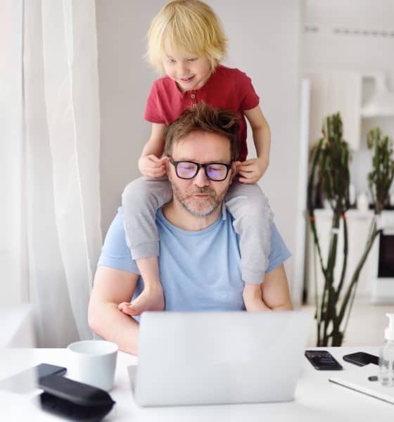 hyperactive child on dads shoulders