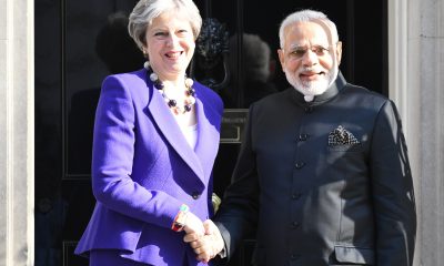 modi and may downing street shaking hands