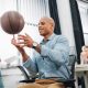 office worker playing basketball at work