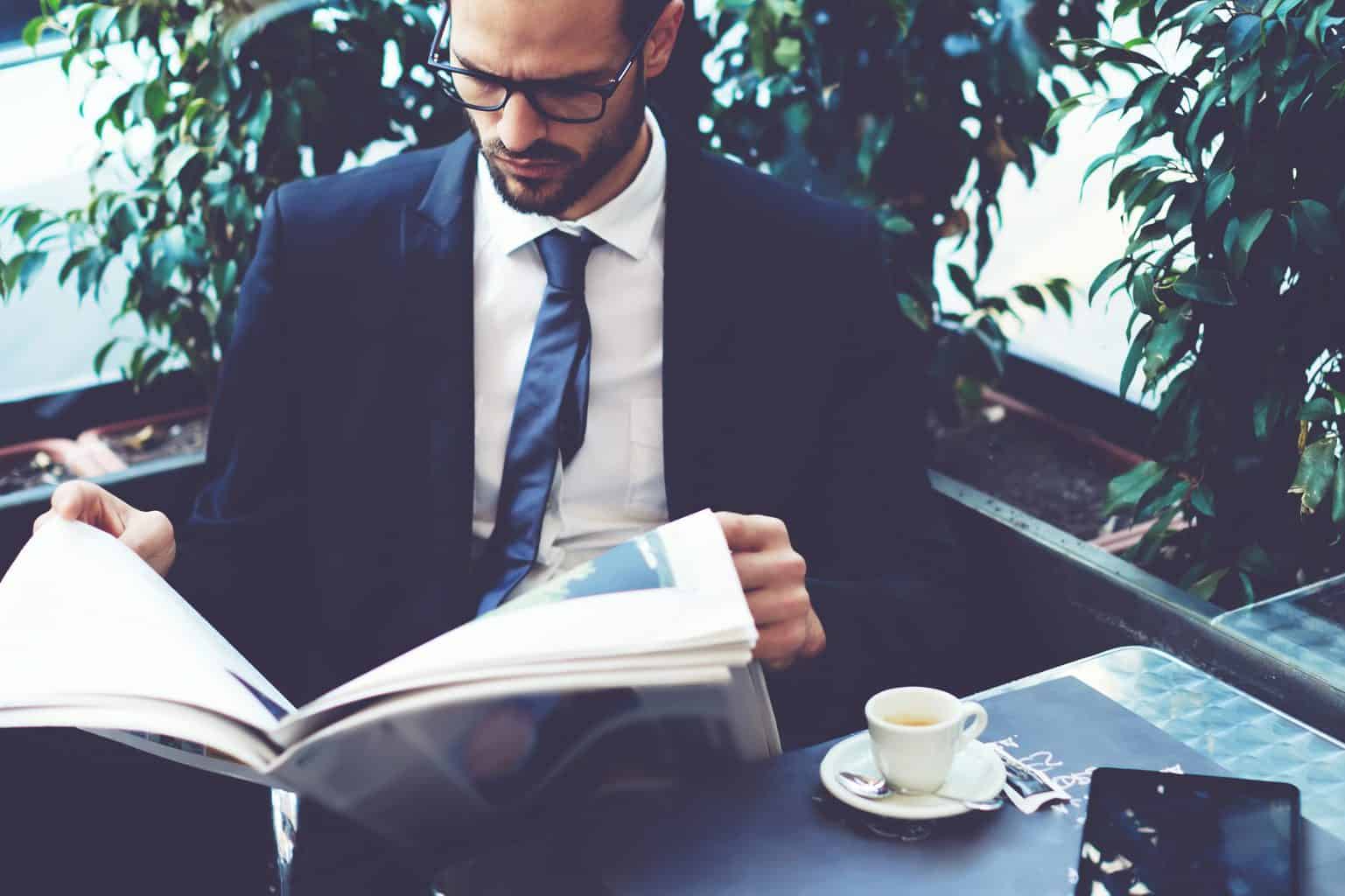 ceo reading newspaper